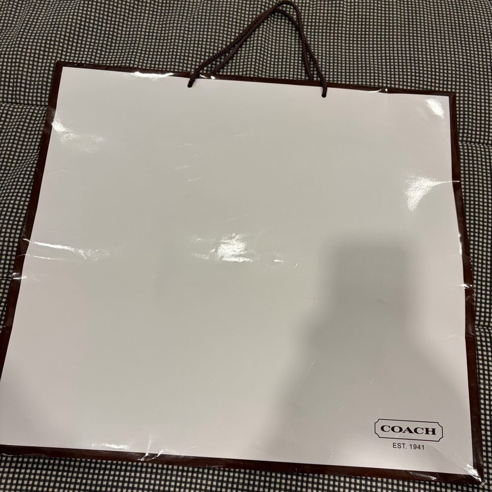3 Coach Bags. White Dust Bag with Logo. Tan bag with pics. White cloth dust bag